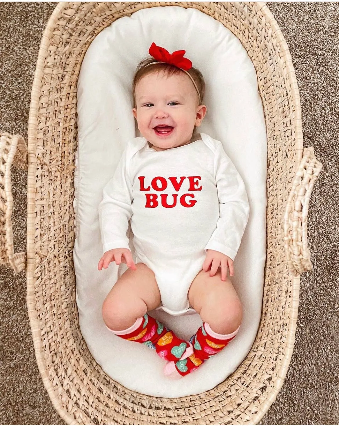 Love Bug Long Sleeve Organic Cotton Bodysuit from Tenth & Pine