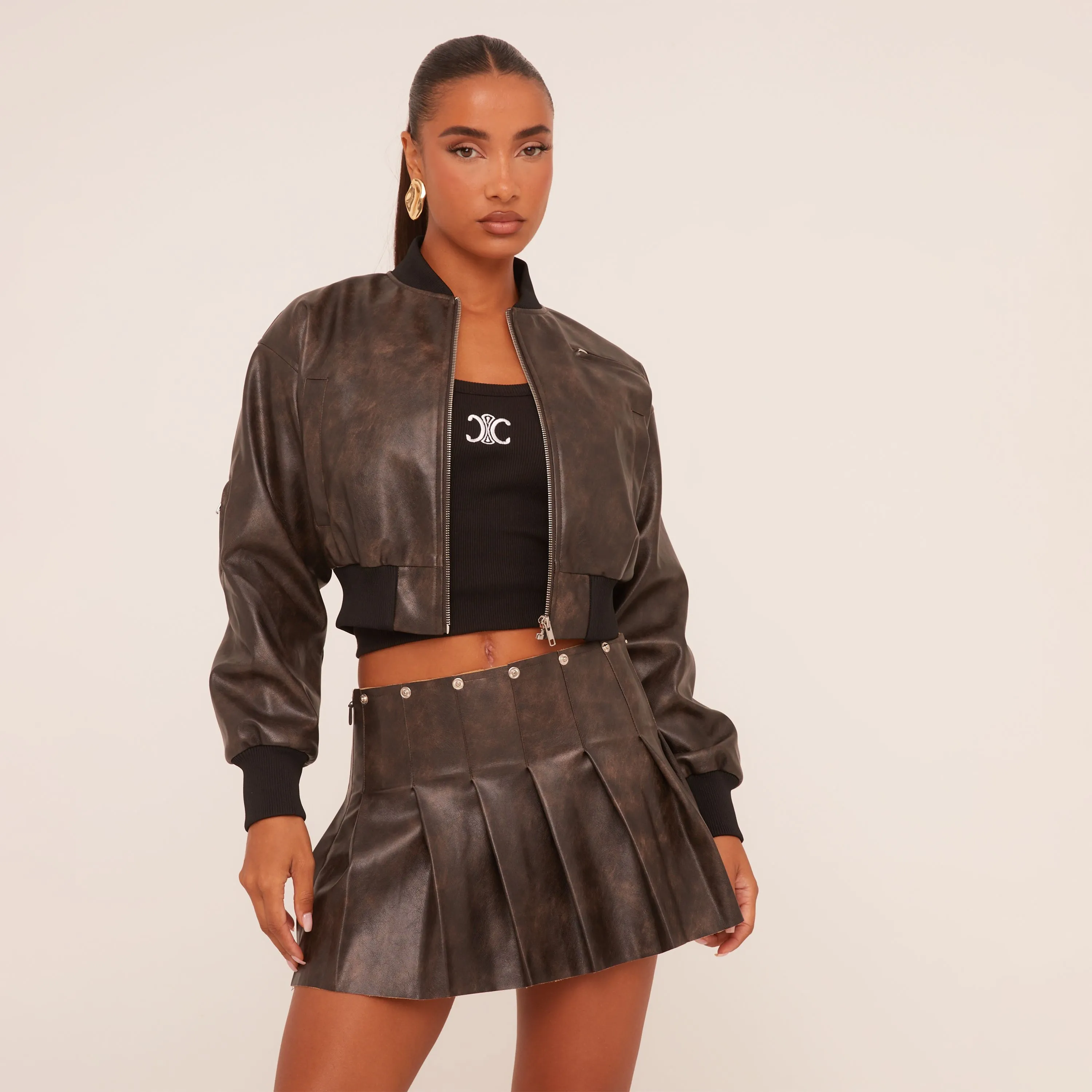 Low Rise Pleated Mini Skirt In Brown Faux Leather